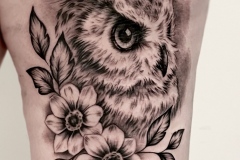 Owl tattoo with flowers by Zindy Ink